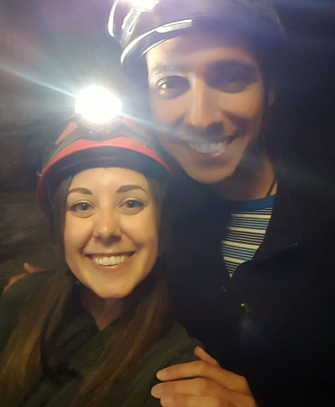 Lauren and Justin selfie in the New Zealand glowworm cave