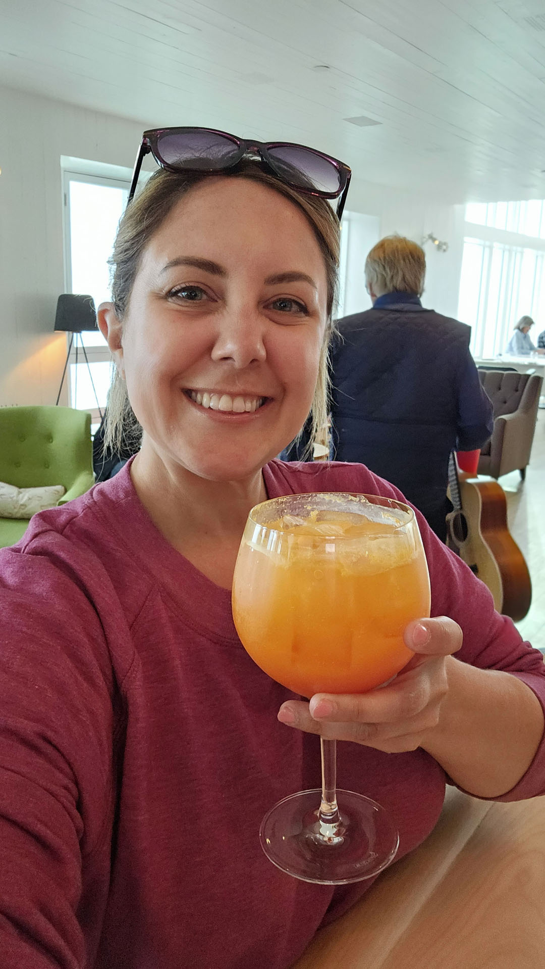 2024-FogoIsland128 Lauren with a cocktail