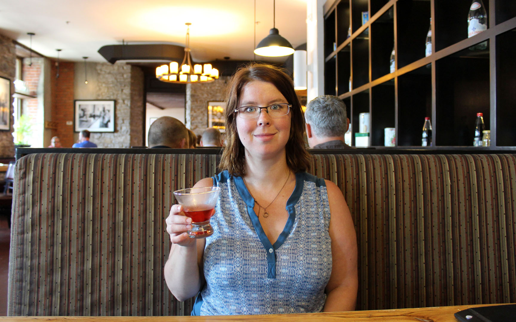 Shannon enjoying a cocktail