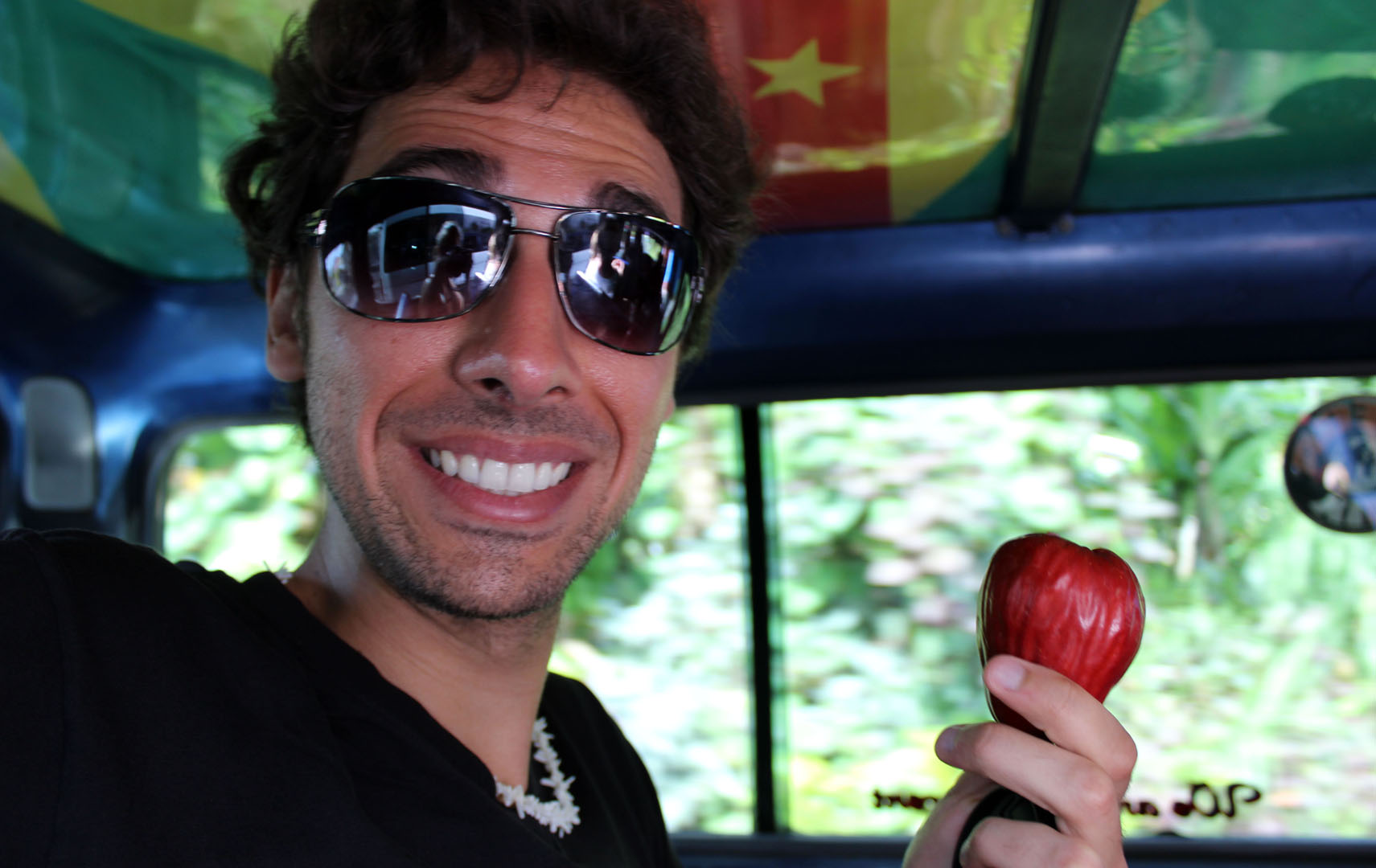 Justin and the cashew fruit